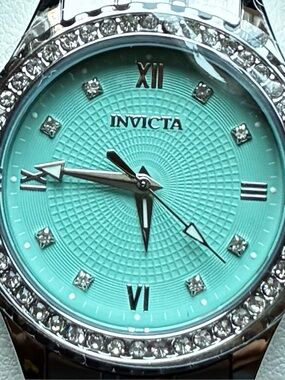 Invicta Women's Silver Watch with Turquoise Blue Dial. 33mm.
